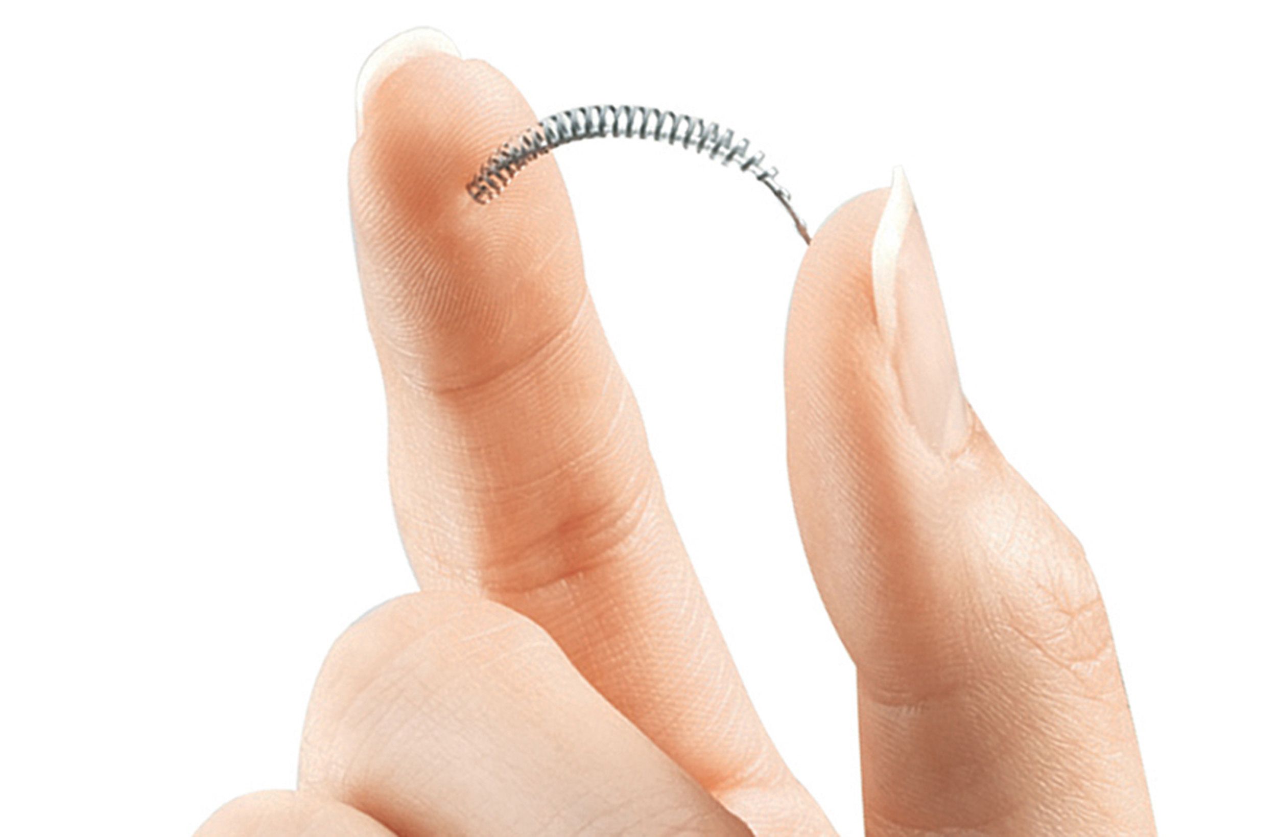 Essure device between fingertips